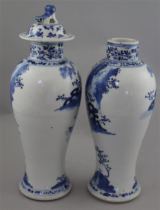 Two Chinese blue and white baluster vases and a cover, late 19th century, 28cm